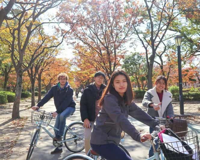 5-Hour Osaka Highlights Bike Tour with Lunch - Getting on the Bike Fast at FamilyMart Tenmabashi