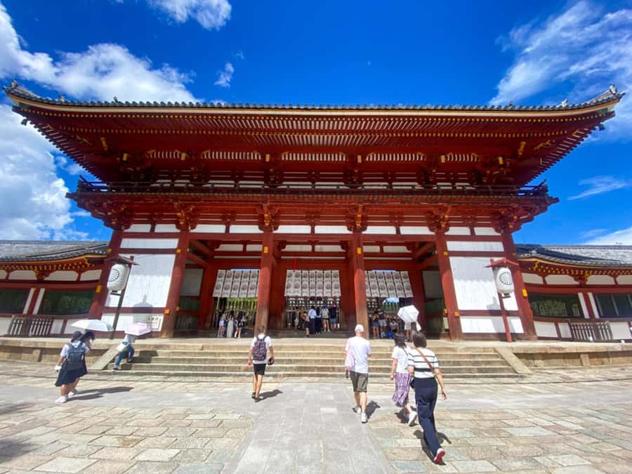 From Osaka: Nara, Kiyomizu-dera & Fushimi Inari Trip - Fushimi Inari Taisha: walking through the red torii path up Mount Inari