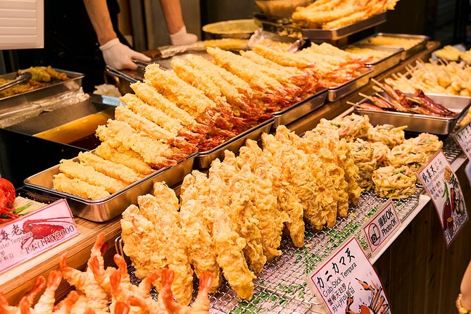 Osaka: 2-Hour Nightlife District Walking & Local Food Culture - Kuromon Market: Osaka’s Kitchen and how to snack with confidence