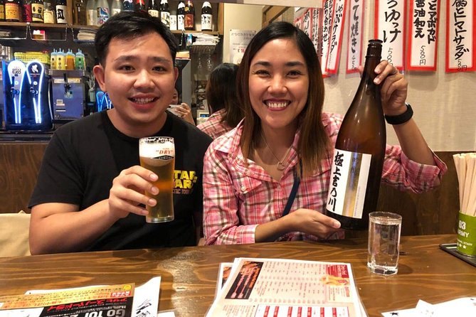 Osaka Bar Hopping Night Walking Tour in Namba (3 bars, 6 tastes) - Shinsaibashi-suji and the Glico billboard: quick sights that help you orient