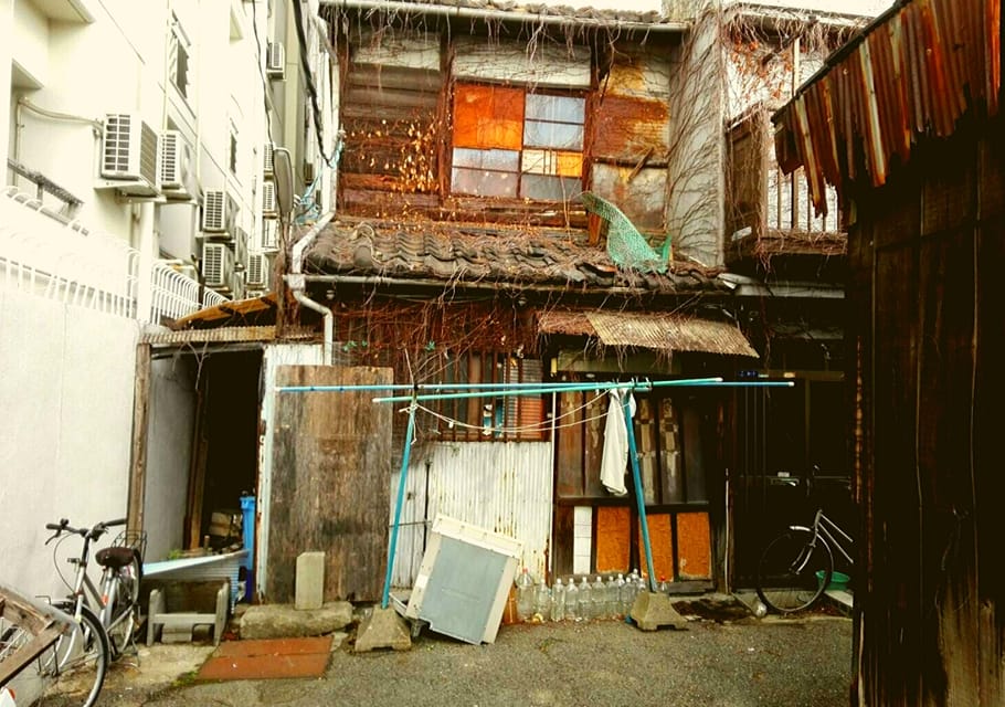 Osaka: Deep Backstreets Walking Tour with Dinner Option - The Abandoned Buildings Zone: A Surreal Walk With a Heavy Past