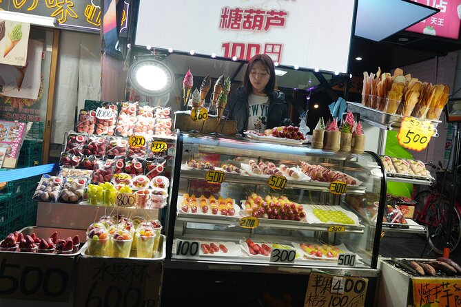 Osaka Delights: Traditional Japanese Food Tour - Dotonbori at night: neon streets and the Ebisu Bridge photo
