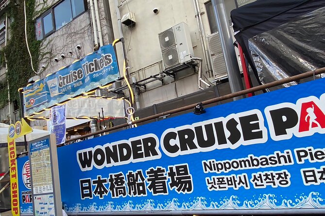 Osaka Dotonbori Wonder Cruise - Stop 1: Dotombori Glico Sign and the Photo Payoff