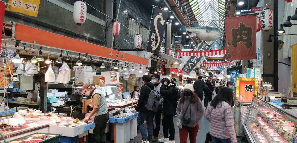 Osaka: Five Must-See Highlights Walking Tour & Ramen Lunch - Shinsekai and Tsutenkaku: Retro Streets, Street Food Energy, and Photos