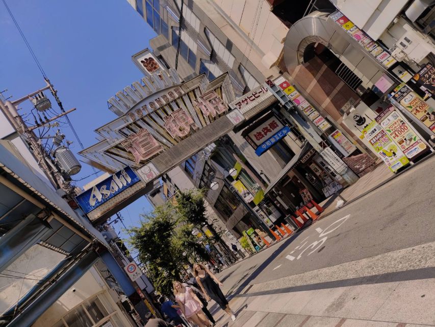 Osaka: Half-day Ultimate Highlights Guided Walking Tour - Namba, Shinsaibashi-suji, and Ebisu Bridge: shopping history meets local meeting points