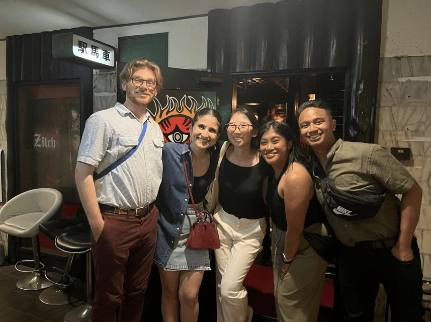 Osaka: Izakaya Bars Guided Walking Tour - Meeting at Dotombori Humanity Song Monument and Getting Oriented Fast