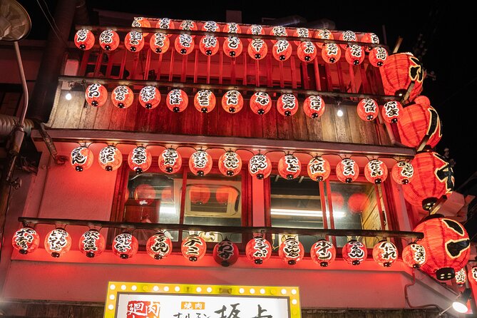 Osaka Local Bar Crawl in Dotombori & Uranamba Area - Namba izakaya stop: gyoza and sashimi with a more local crowd