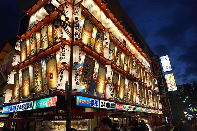 Osaka Local Foodie Walking Tour in Dotonbori and Shinsekai - Stop 3: Dōgu-ya-suji and the Dotonbori souvenir street rhythm