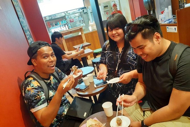 Osaka Local Foodie Walking Tour in Dotonbori and Shinsekai - Stop 4 and 5: Hozen-ji Temple, Ukiyo Alley snacks, then the Glico sign