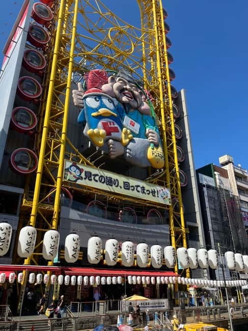 Osaka: Private and Fully Customized Tour with Hotel Meet Up - Shinsekai: street texture and a different Osaka mood