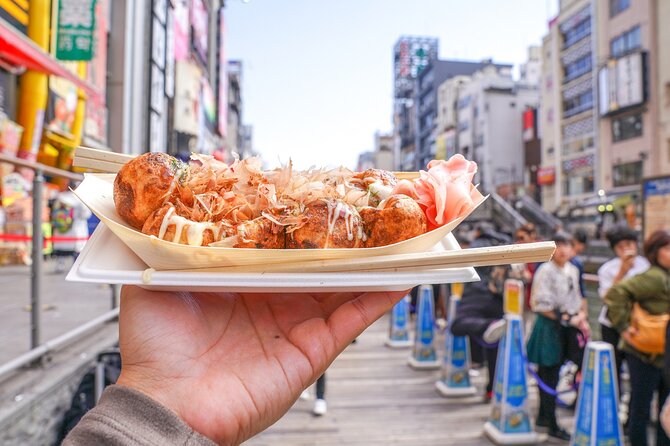 Osaka Private Half-Day Tour with a Local – Secrets & Highlights - Shinsekai’s retro mood: Paris and New York vibes in Osaka