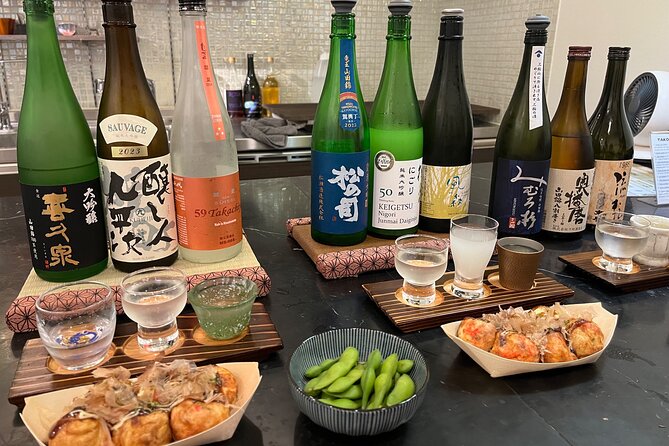 Osaka Sake Tasting & Takoyaki Cooking Experience - Takoyaki DIY in a small kitchen: batter, cooking, and the flip