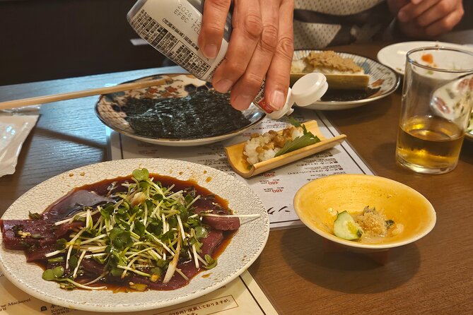Osaka: Shinsekai Food Tour - 13 Dishes at 5 Local Eateries - Jyanjyan Yokocho’s covered lane: snack hopping in 180 meters