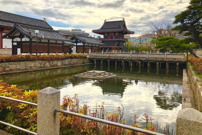Osaka: Walking Tour to Local Gems, Food & Culture - Dotonbori photo stop: iconic views, explained in plain language