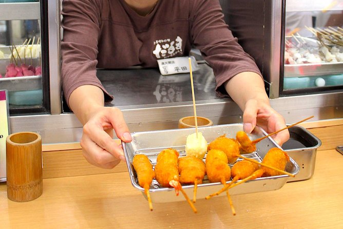 Retro Osaka Street Food Tour: Shinsekai - Takoyaki-making and mixed juice: the hands-on part that sets this tour apart