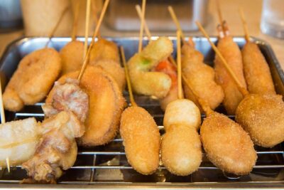 Retro Osaka Street Food Tour: Shinsekai - Tsutenkaku to Billiken: your first landmarks and why the start matters